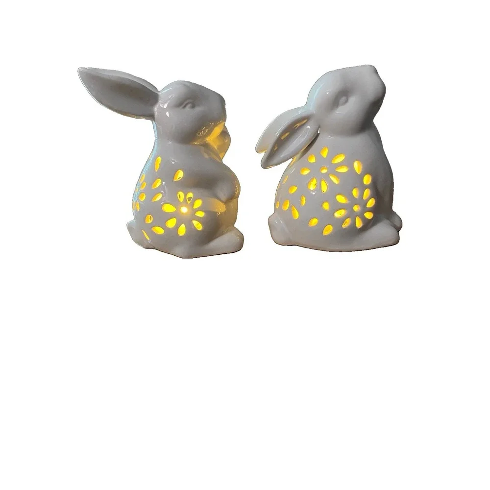 White Ceramic Rabbits Animal Figurine with Cutout Floral Pattern. Lighted.